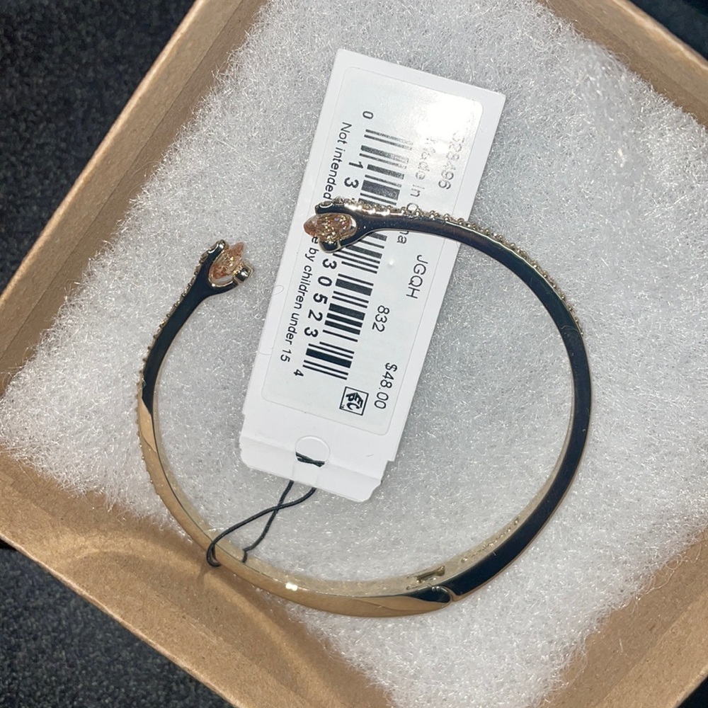Givenchy gold crystal & pave hinged bangle for women’s